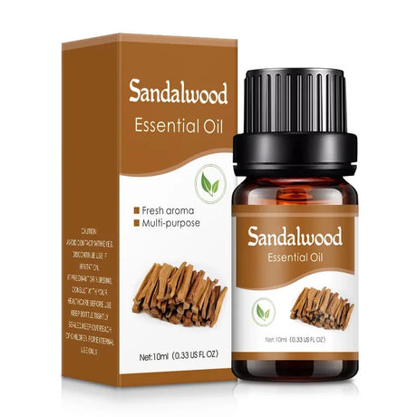 Sandalwood essential oil bottle and packaging on a white background