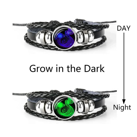 Bracelet with glowing purple and green charms on a white background