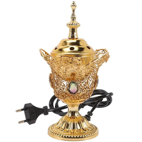 Decorative gold lamp with intricate design on a white background