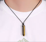 Necklace with a pendant on a mannequin wearing a white shirt, brand 'CIA' visible.