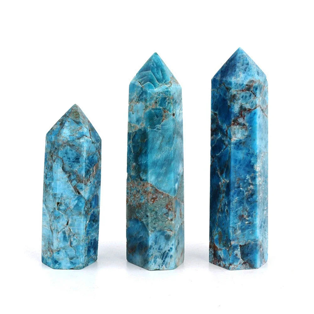 Three blue crystal points on a white background