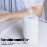 Portable humidifier on a desk with text highlighting its benefits