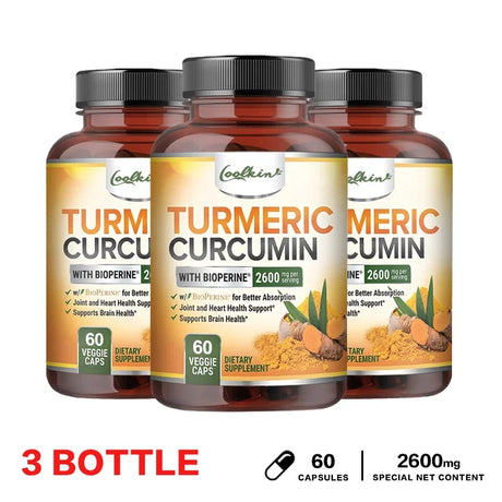Three bottles of Turmeric Curcumin supplement with Bioperine on a white background