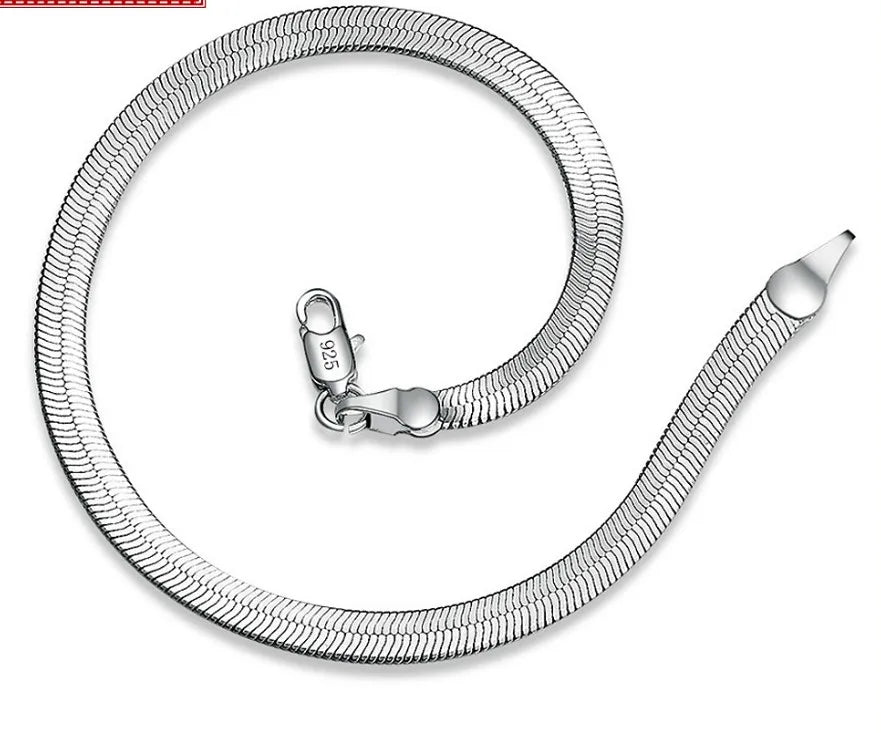 Silver snake chain bracelet on a white background