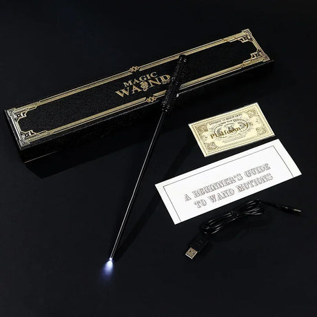 Magic wand with packaging, USB cable, and instruction sheet on a black background