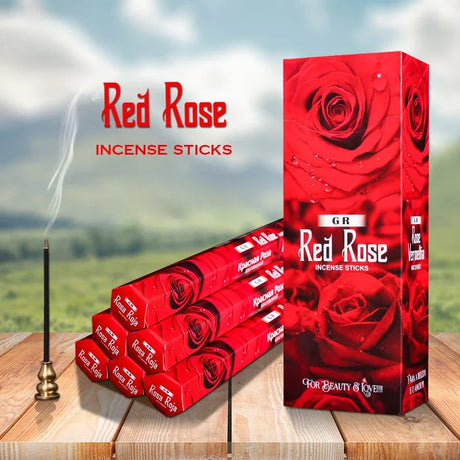 Red Rose incense sticks packaging with a scenic background