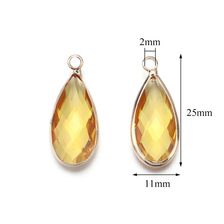 Teardrop-shaped yellow gemstone pendants with measurements on a white background