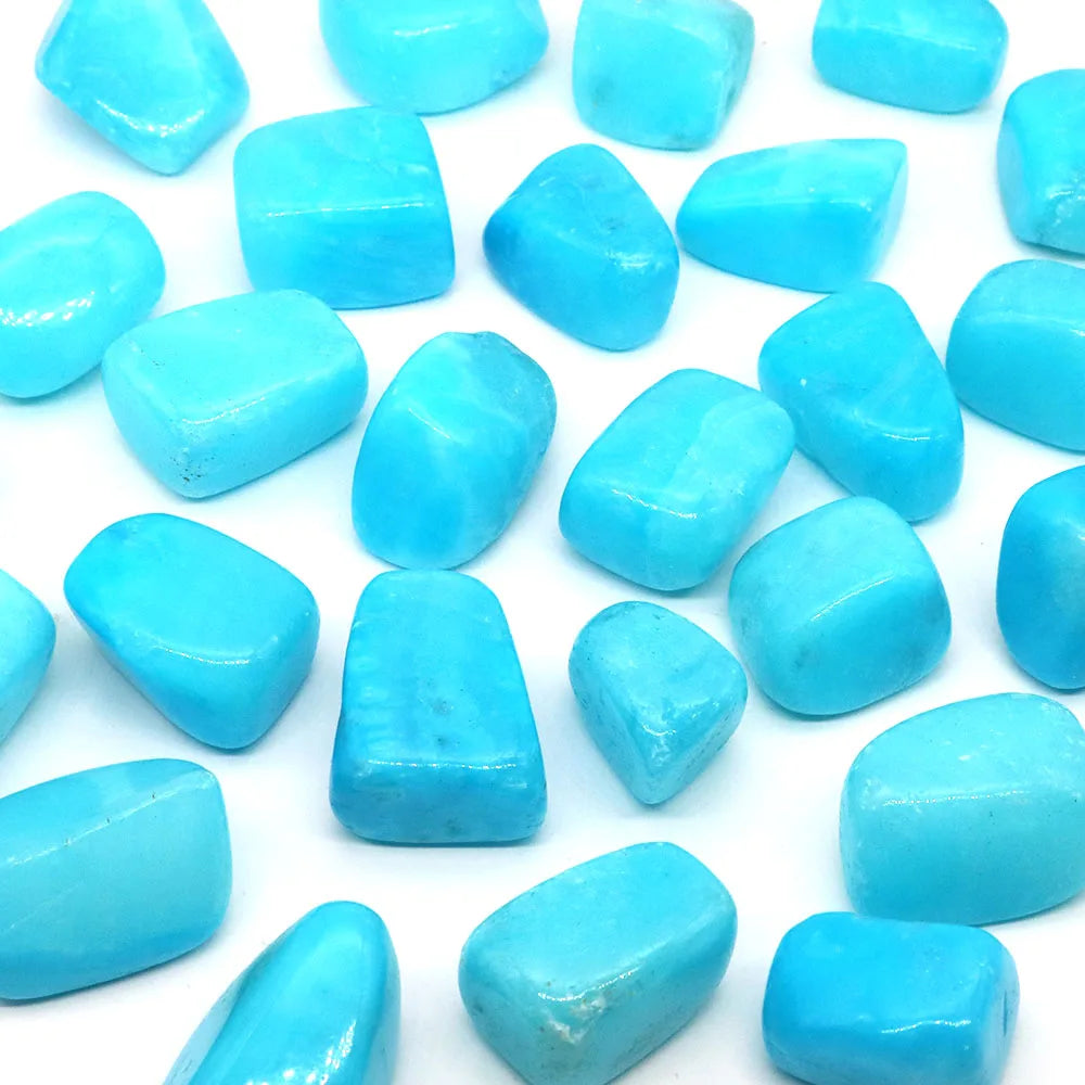 Turquoise stones on a white background