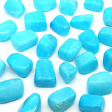 Turquoise stones on a white background