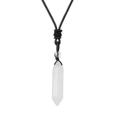 Necklace with a white crystal pendant on a black cord against a white background