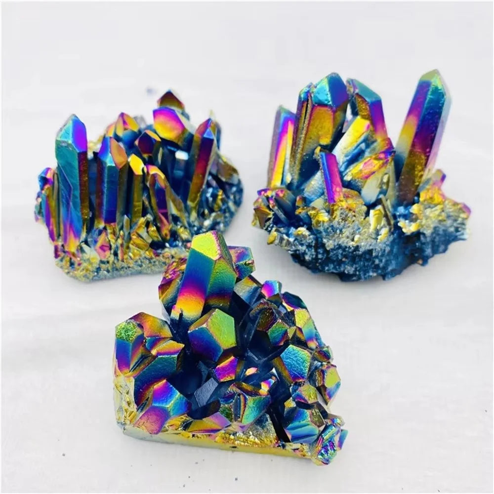 Three colorful crystal formations on a white background