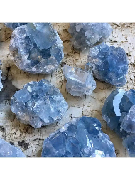Blue crystal rocks on a textured surface
