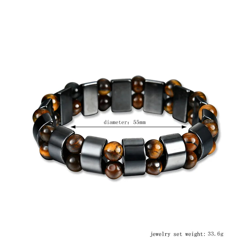 Bracelet with black, brown, and silver beads on a white background