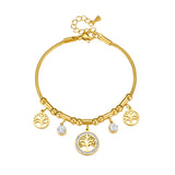 Gold bracelet with tree-of-life charms on a white background