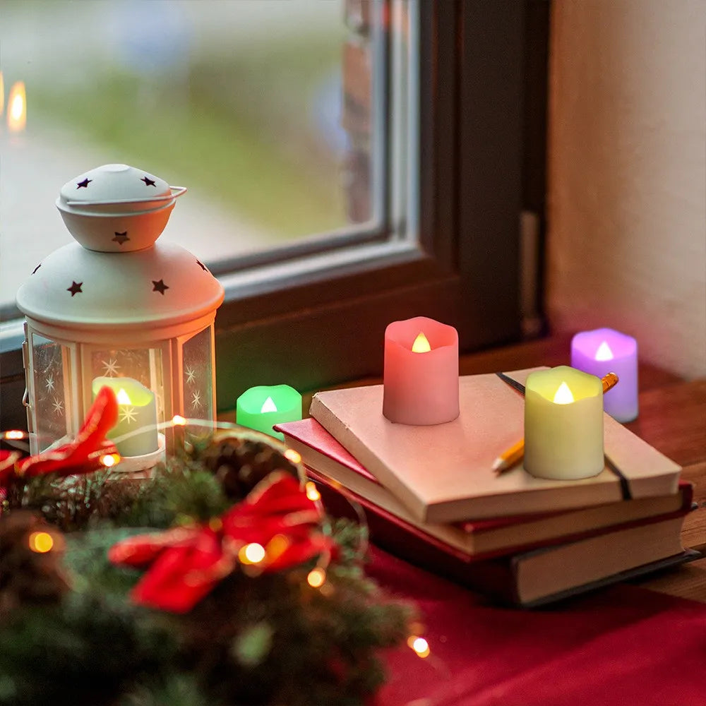 Decorative setup with candles, lantern, and books on a windowsill.
