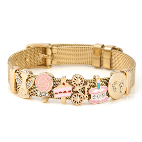Gold bracelet with various charms on a white background