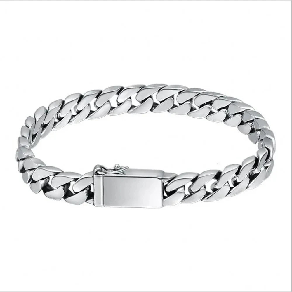 Silver chain bracelet on a white background