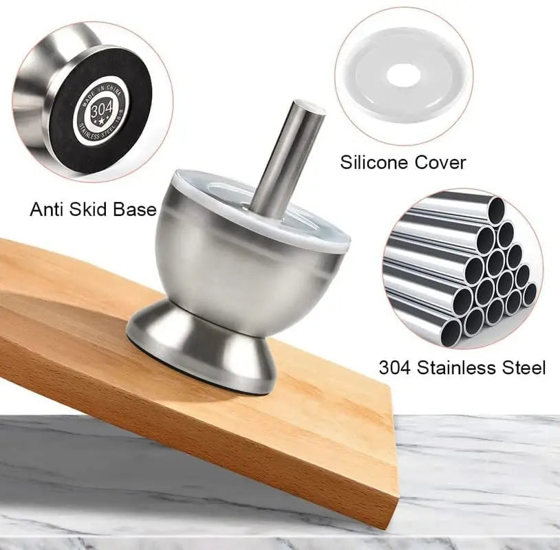 Stainless steel kitchen tool with anti-skid base, silicone cover, and 304 stainless steel details on a wooden surface.