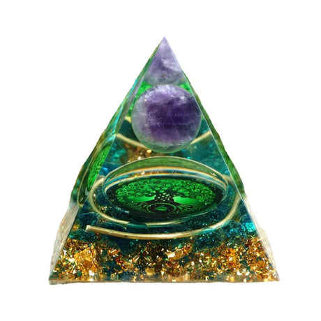 Triangular crystal pyramid with purple sphere and gold glitter on a white background