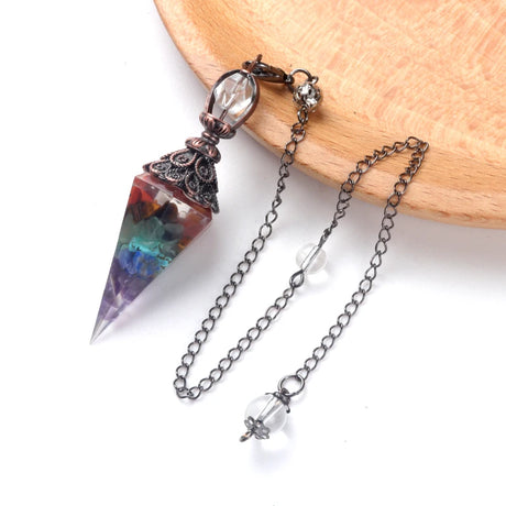 Crystal pendant necklace with chain on a white background