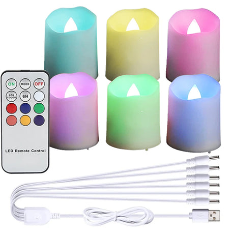 Set of colorful LED candles with a remote control on a white background