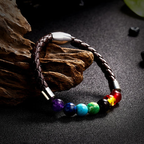Bracelet with colorful beads on a dark surface