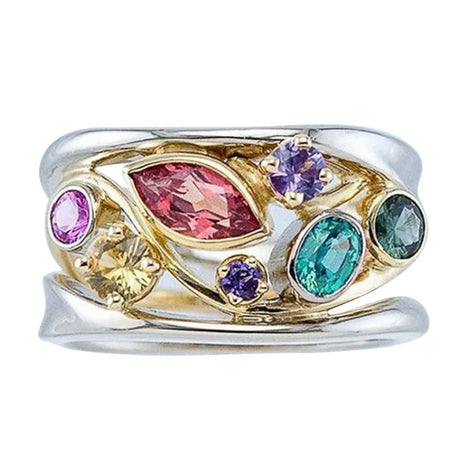 Ring with colorful gemstones on a white background
