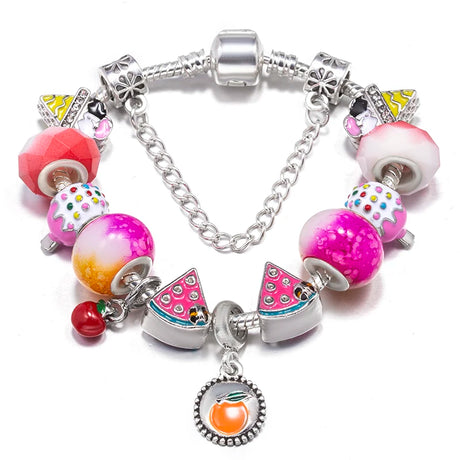 Colorful bracelet with various charms on a white background
