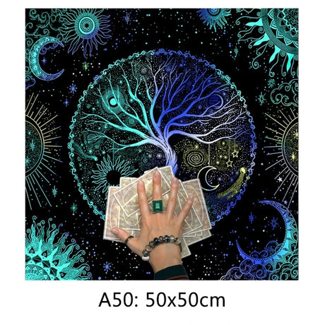 Hand with tarot cards on a mystical tree of life design