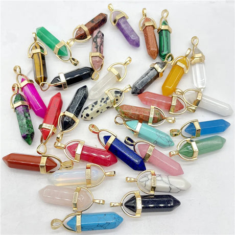 Collection of colorful crystal pendants on a white background