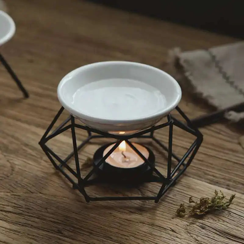 White ceramic bowl with a black geometric holder on a wooden surface