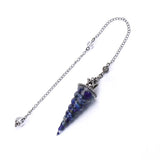 Crystal pendulum with chain on a white background