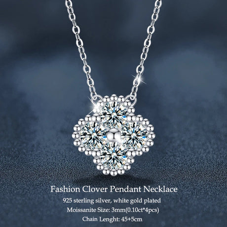 Silver necklace with a clover pendant on a dark background