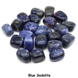 Collection of blue sodalite stones on a white background