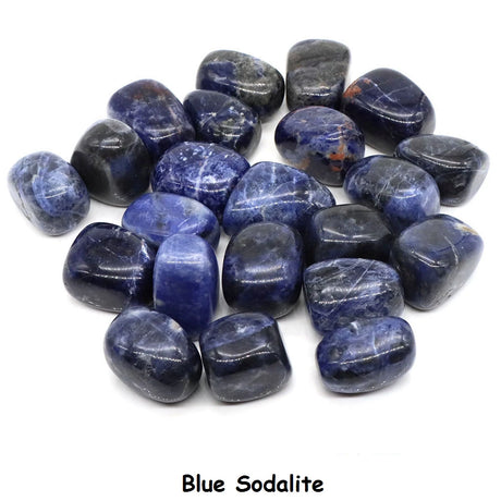Collection of blue sodalite stones on a white background