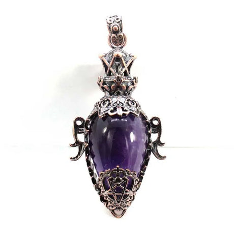 Purple pendant with intricate metalwork on a white background