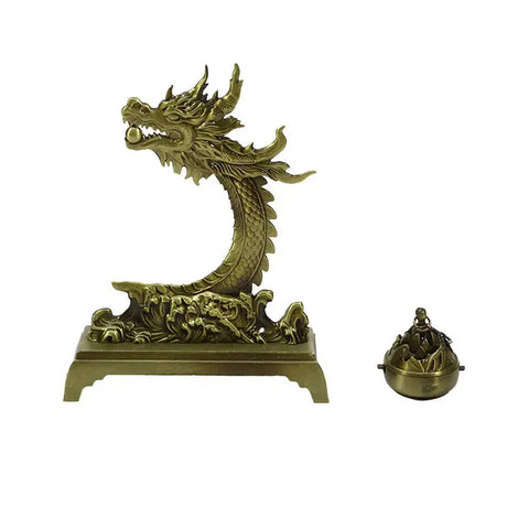 Bronze dragon sculpture with incense burner on a white background