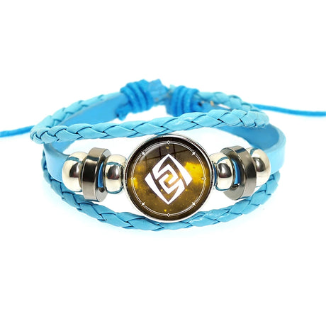 Blue braided bracelet with a circular metal charm featuring a logo on a white background