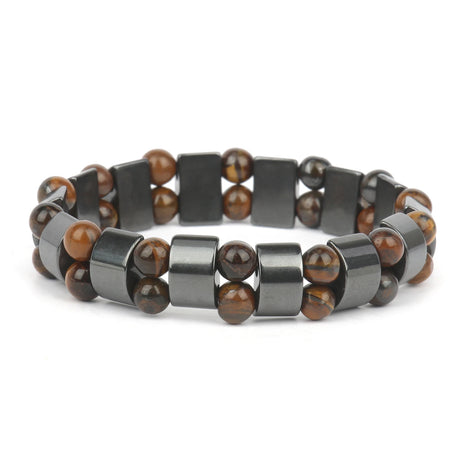 Bracelet with brown beads and gray metal links on a white background