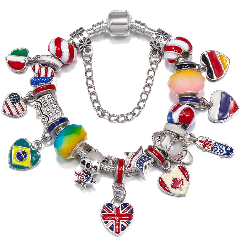 Multicolored charm bracelet with various charms on a white background