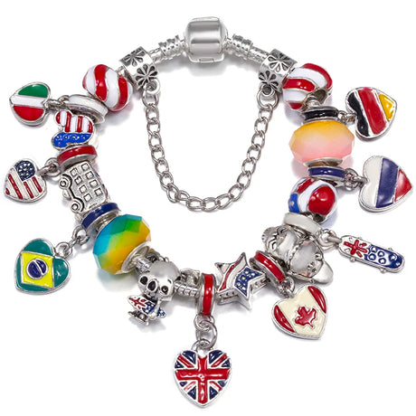 Multicolored charm bracelet with various charms on a white background