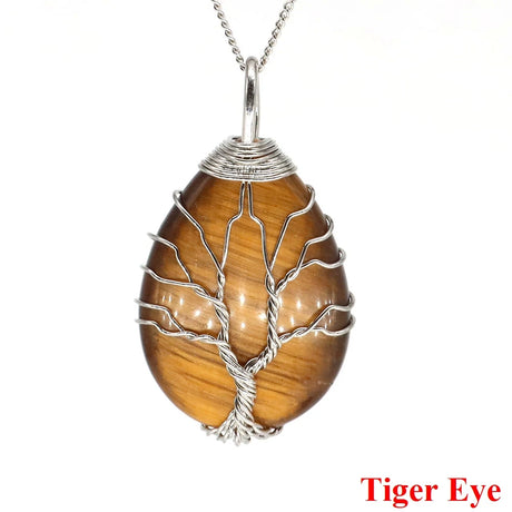 Tiger eye pendant with silver wire wrapping on a white background