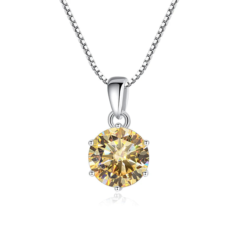 Gold diamond pendant on a silver chain against a white background