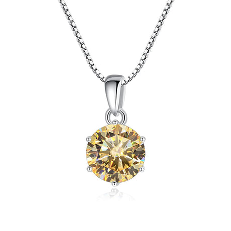 Gold diamond pendant on a silver chain against a white background