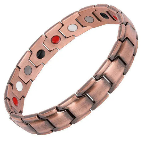 Copper bracelet with embedded magnets on a white background
