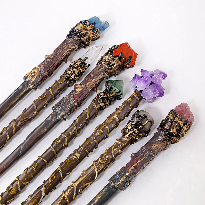 Set of decorative wands with crystal elements on a white background
