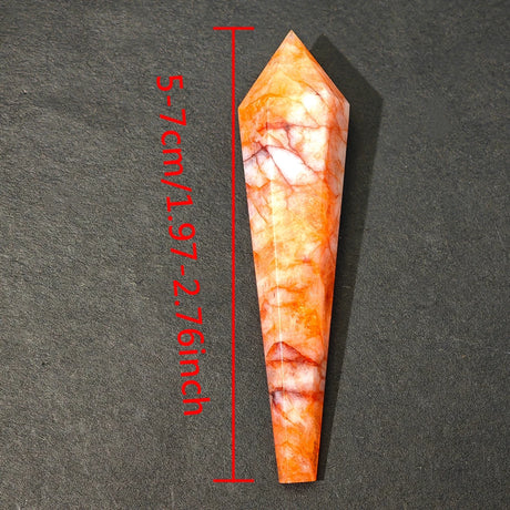 Marbled stone tool with measurements on a dark gray background