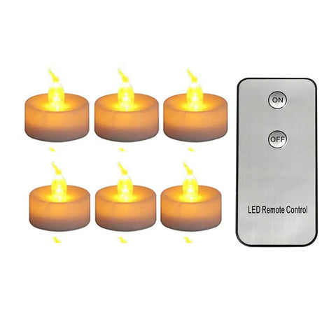 Set of six LED candles with a remote control on a white background