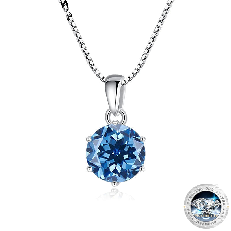 Blue gemstone pendant necklace with 'Butterflykiss' branding on a white background