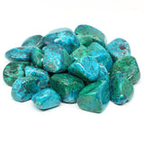 Turquoise stones on a white background